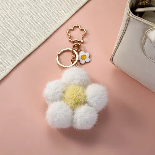 porte cle fleur blanc coeur jaune