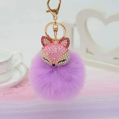 porte cle renard pompon fausse fourrure violet pale