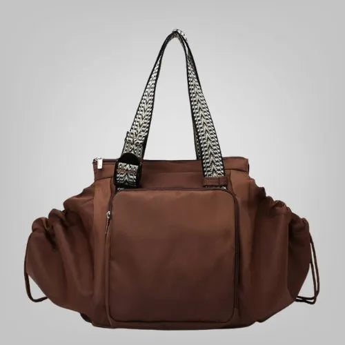 sac a dos multi fonction 15 pochettes brun