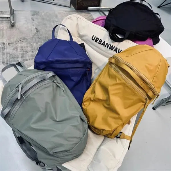sac a dos pliable impermeable 15L deux coloris disponible noir et jaune