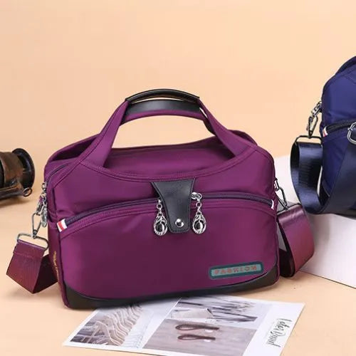 sac bandouliere femme multi pochettes mauve