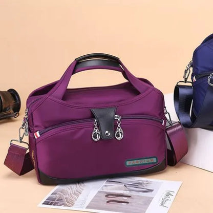 sac bandouliere femme multi pochettes mauve